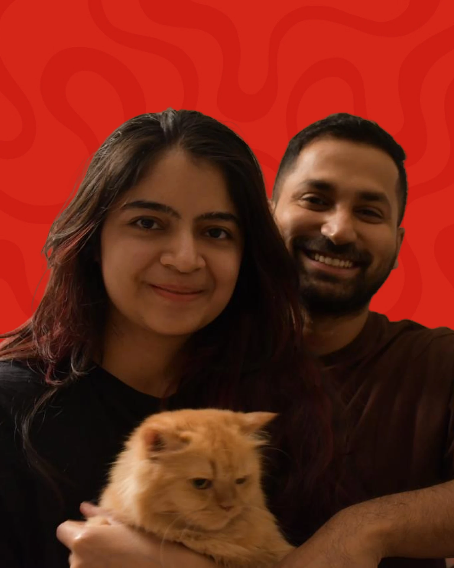 Cleos founders holding their ginger cat